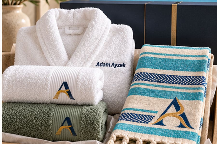 Adam Ayzek branded promotional textile gift set with custom towel, robe and peshtemal